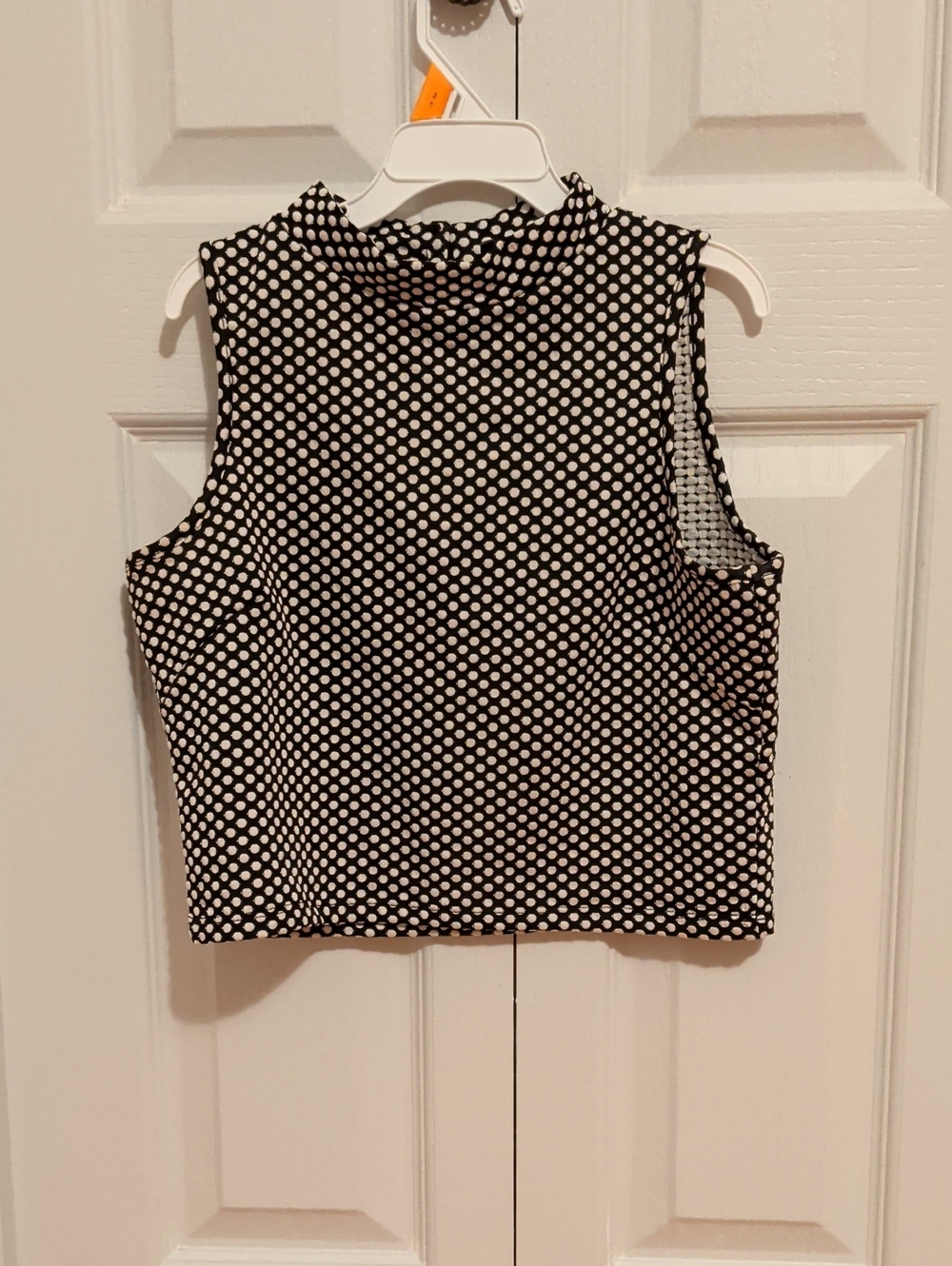 Sleeveless Black and White Polka Dot Mock Neck Top